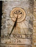 Sundial on Charlbury Church  on  the  Oxfordshire sundial trail on www.sundials.co.uk